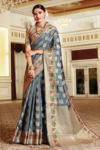 You Will Definitely Earn Lots Of Compliments In Traditional Look Wearing This Beautiful Silk Based Saree In Grey Color. This Saree Is Light Weight, Durable And Easy To Carry All Day Long