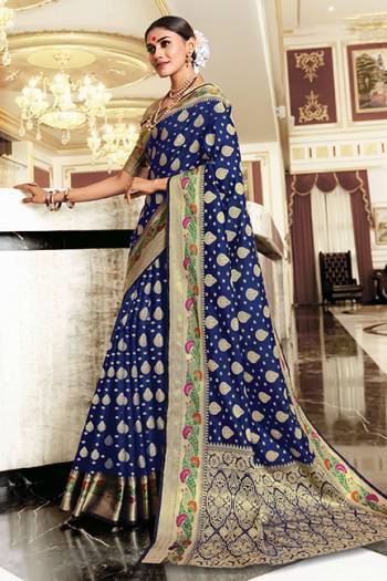 You Will Definitely Earn Lots Of Compliments In Traditional Look Wearing This Beautiful Silk Based Saree In Navy Blue Color. This Saree Is Light Weight, Durable And Easy To Carry All Day Long