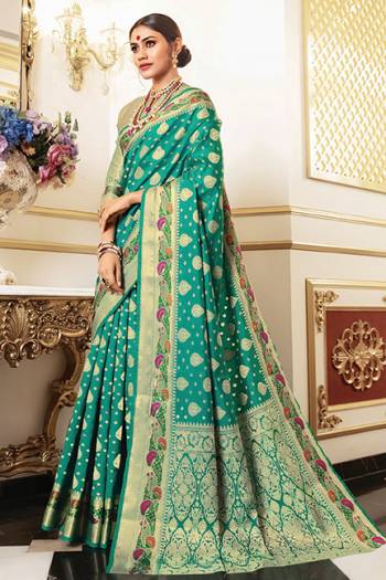 Celebrate This Festive Season With Beauty And Comfort In This Light Weight Silk Based Saree In Sea Green Color. This Pretty Weaved Saree And Blouse Are Fabricated On Art Silk Which Gives A Rich Look To Your Personality.