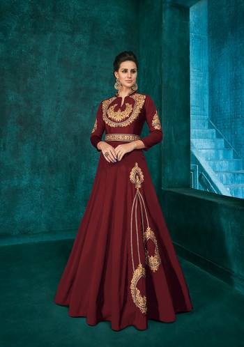 Bright And Visually Appealing Color Is Here With This Very Beautiful Designer Readymade Gown In Maroon Color Fabricated Soft Art Silk. It Is Beautified With Minimal Elegant Looking Embroidery Which Will Earn You Lots Of Compliments From Onlookers