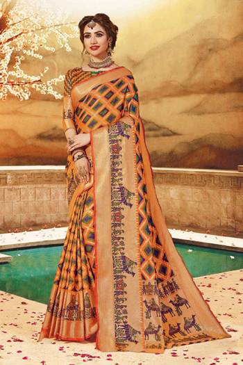 Here Is A Rich Silk Based Saree In Orange Color. This Pretty Saree And Blouse Are Fabricated On Art Silk bEautified With Detailed Weave All Over It. Buy This Saree For Upcoming Festive And Wedding Season. 