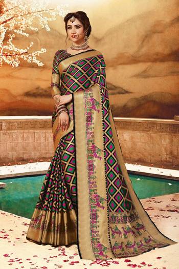 Here Is A Rich Silk Based Saree In Black Color. This Pretty Saree And Blouse Are Fabricated On Art Silk bEautified With Detailed Weave All Over It. Buy This Saree For Upcoming Festive And Wedding Season. 