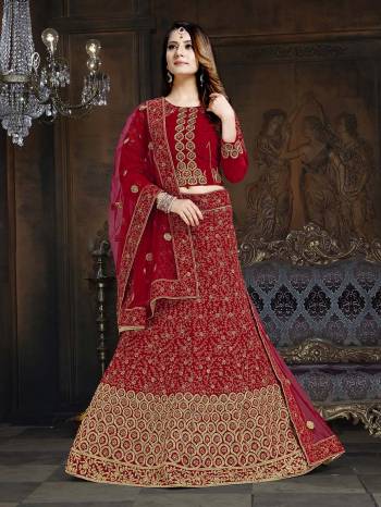 Get Ready For The Upcoming Wedding Season With This Very Beautiful Heavy Designer Lehenga Choli In All Over Red Color. Its Blouse And Lehenga Are Fabricated On Velvet Paired With Net Fabricated Dupatta. Buy Now.