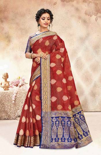 For A Royal Look, Grab This Beautiful Saree In Maroon Color Paired With Contrasting Royal Blue Colored Blouse. This Saree And Blouse Are Silk Based Beautified With Weave. 