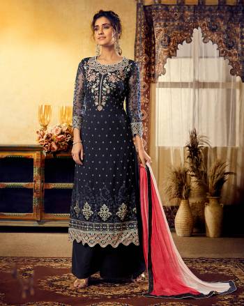 Enhance Your Personality Wearing This Heavy Designer Straight Suit In Navy Blue Colored Top And Bottom Paired With Contrasting Dark Pink Colored Dupatta. Its Top Is Beautified With Heavy Jari And Thread Work.