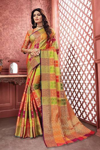 Go Colorful With This Designer Silk Based Saree In Multi Color. This Saree And Blouse Are Fabricated On Art Silk Beautified With Multi Colored Checks And Heavy Weave All Over. Buy Now.