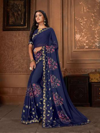 Enhance Your Personality Wearing This Pretty Saree In Dark Blue Color Paired With Dark Blue Colored Blouse .This Saree Is Georgette Based Paired With Art Silk Fabricated Blouse. Its Fabric Is Light Weight And Easy To Carry All Day Long. 