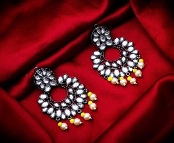 Grab These Beautiful Pair Of Earrings In Silver Color Beautified With Stone And Pearl Work. You Can Pair This Up With Any Kind Of Kurti, Suit Or Lehenga. Buy Now.