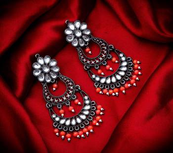 Grab These Beautiful Pair Of Earrings In Silver Color Beautified With Stone And Pearl Work. You Can Pair This Up With Any Kind Of Kurti, Suit Or Lehenga. Buy Now.