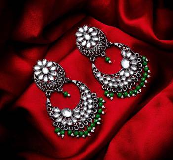 Grab These Beautiful Pair Of Earrings In Silver Color Beautified With Stone And Pearl Work. You Can Pair This Up With Any Kind Of Kurti, Suit Or Lehenga. Buy Now.