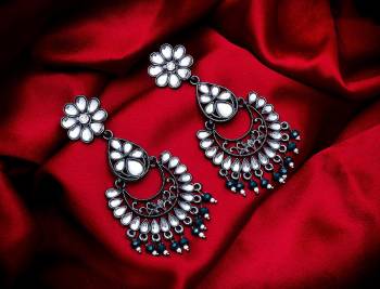 Grab These Beautiful Pair Of Earrings In Silver Color Beautified With Stone And Pearl Work. You Can Pair This Up With Any Kind Of Kurti, Suit Or Lehenga. Buy Now.