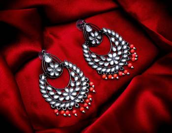 Grab These Beautiful Pair Of Earrings In Silver Color Beautified With Stone And Pearl Work. You Can Pair This Up With Any Kind Of Kurti, Suit Or Lehenga. Buy Now.