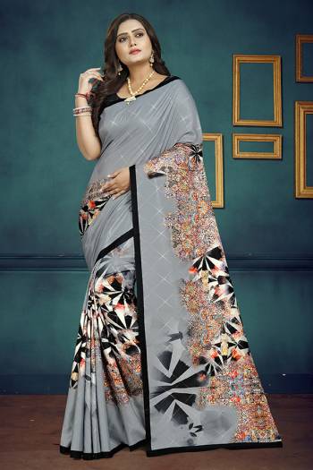 Grab This Beautiful Digital Printed Designer Saree In Grey Color Paired With Black Colored Blouse. This Saree And Blouse Are Fabricated On Soft Silk. It Is Light In Weight, Soft Towards Skin And Easy To Carry All Day Long. 