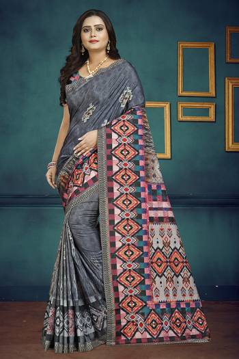 For Your Semi-Casuals, Grab This Pretty Digital Printed Saree In Dark Grey Color Paired With Multi Colored Blouse. This Saree And Blouse Are Soft Silk Based Which Also Gives A Rich Look To Your Personality. 