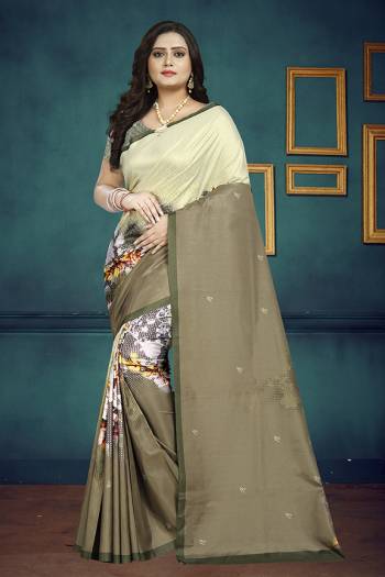 For Your Semi-Casuals, Grab This Pretty Digital Printed Saree In Cream And Sand Grey Color Paired With Sand Grey Colored Blouse. This Saree And Blouse Are Soft Silk Based Which Also Gives A Rich Look To Your Personality. 