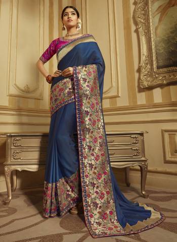 Here Is A Rich Designer Saree In Navy Blue Color Paired With Contrasting Rani Pink Colored Blouse. This Saree And Blouse Are Fabricated On Soft And Jacquard Silk Paired With Art Silk Fabricated Blouse. Buy This Lovely Designer Piece Now.