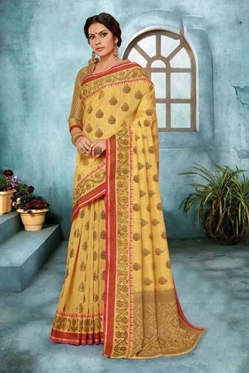 This Festive Season Look The Most Elegant Of All In This Pretty Yellow Colored Saree. This Weaved Saree Is Fabricated On Cotton Art Silk Paired With Jacquard Silk Fabricated Blouse. It Is Light In Weight, Durable And Easy To Care For. 