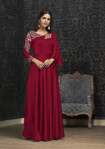 Here Is A Solution For Your Party Wear Dresses With This Designer Readymade Gown In Dark Pink Color Fabricated On Glowing Georgette. It Has Very Beautiful Pattern With Detailed Embroidery And Available In All Regular Sizes. Buy Now.