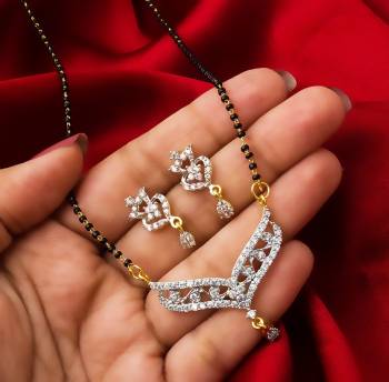 Grab This Very Pretty Mangalsutra Set With A Whole New Design And Pattern. This Pretty Set Can Be Paired With Any Colored Ethnic Attire. It Is Light Weight And Easy To Carry All Day Long.