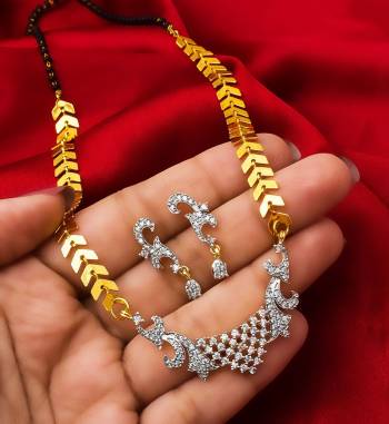 Grab This Very Pretty Mangalsutra Set With A Whole New Design And Pattern. This Pretty Set Can Be Paired With Any Colored Ethnic Attire. It Is Light Weight And Easy To Carry All Day Long.