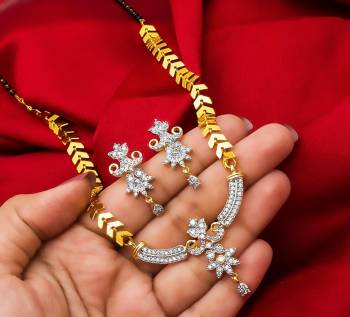 Grab This Very Pretty Mangalsutra Set With A Whole New Design And Pattern. This Pretty Set Can Be Paired With Any Colored Ethnic Attire. It Is Light Weight And Easy To Carry All Day Long.