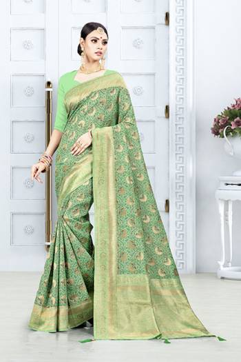 Grab This Pretty Floral Saree In Green Color Paired With Green Colored Blouse. This Saree Is Fabricated On Weaving Silk Paired With Art Silk Fabricated Blouse. This Pretty Saree Is Light Weight, Durable And Easy To Care For.