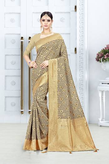 Grab This Pretty Floral Saree In Beige Color Paired With Beige Colored Blouse. This Saree Is Fabricated On Weaving Silk Paired With Art Silk Fabricated Blouse. This Pretty Saree Is Light Weight, Durable And Easy To Care For.