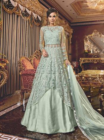 Another Two Way Suit IS Here With This Designer Indo Western Suit Baby Blue Color.  Its Pretty Tone To Tone Embroidered Top IS Net Based Paired With Net Bottom , Satin Lehenga And Net Fabricated Dupatta. 