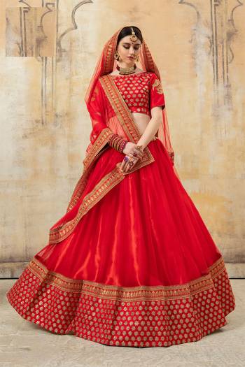 Adorn The Pretty Angelic Look Wearing This Designer Lehenga Choli In All Over Red Color. Its Pretty Blouse Is Fabricated On Net Paired With Net Fabricated Lehenga And Dupatta. It IS Beautified With Heavy Embroidery Making It More Attractive With Red.