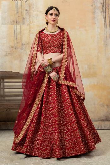 You Will Definitely Earn Lots Of Compliments Wearing This Heavy Designer Lehenga Choli In Lovely Red Color. This Pretty Lehenga Choli Is Silk Based Paired With Net Fabricated Dupatta. Buy Now.