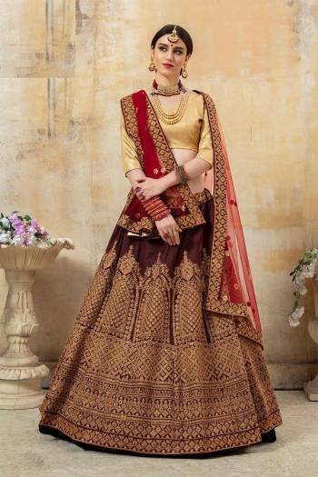 Grab This Attractive Looking Heavy Designer Lehenga Choli In Golden Colored Blouse Paired With Maroon Colored Lehenga And Dupatta. This Pretty Lehenga Choli Is Based Paired With Net Fabricated Dupatta. Buy This Pretty Piece Now.