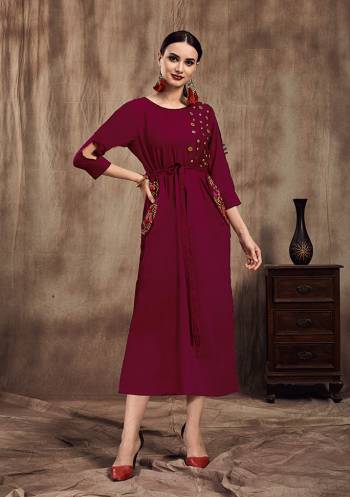 Grab This Bold And Beautiful Looking Designer Readymade Kurti In Magenta Pink Color Fabricated On Muslin. It Is Beautified With Attractive Embroidery With Thread And Buttons. 