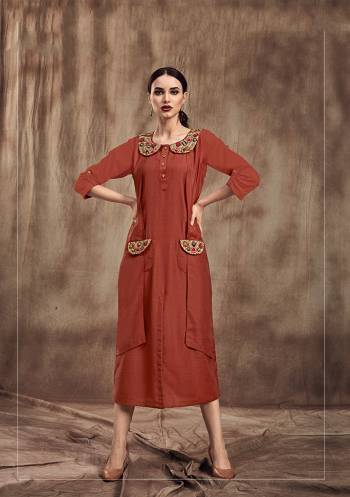 Add This New Shade In Red With This Readymade Kurti In Rust Red Color. This Designer Kurti Is Fabricated On Muslin Beautified With Pattern And Embroidery. 