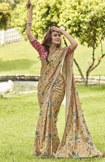 This Festive Season, Look The Most Elegant Of All In This Designer Saree In Beige Color paired With Pink Colored Blouse. This Saree And Blouse Are Silk Based Beautified With Lovely Floral Prints And Lace Border. Buy Now.