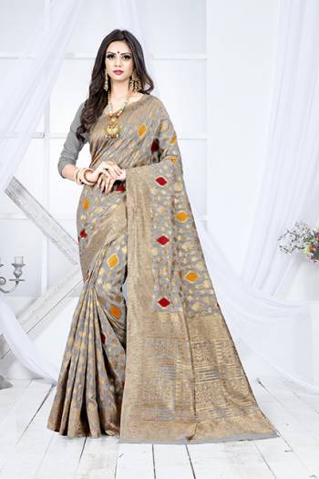 Shine Bright In This Designer Silk Based Saree In Grey Color Paired With Grey Colored Blouse. This Saree Is Fabricated On Weaving Silk Paired With Art Silk Fabricated Blouse. It Has Rich Fabric Beautified With Detailed Weave All Over. Buy Now.