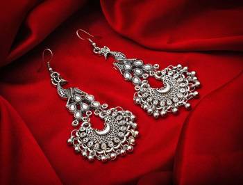 Buy This Pretty Pair Of Earrings In Silver Color Which Can Be Paired With Colored Attire. These Earrings Will Give A Pretty Elegant Look Which Will Earn You Lots Of Compliments From Onlookers.