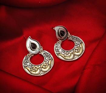 Buy This Pretty Pair Of Earrings In Silver Color Which Can Be Paired With Colored Attire. These Earrings Will Give A Pretty Elegant Look Which Will Earn You Lots Of Compliments From Onlookers.