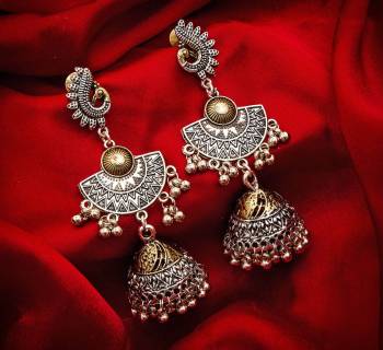 Buy This Pretty Pair Of Earrings In Silver Color Which Can Be Paired With Colored Attire. These Earrings Will Give A Pretty Elegant Look Which Will Earn You Lots Of Compliments From Onlookers.