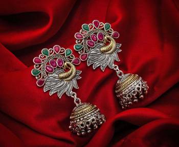 Buy This Pretty Pair Of Earrings In Silver Color Which Can Be Paired With Colored Attire. These Earrings Will Give A Pretty Elegant Look Which Will Earn You Lots Of Compliments From Onlookers.