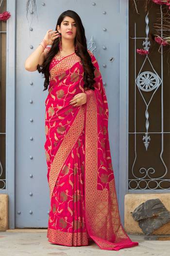 Here Is A Very Beautiful And Attractive Looking Designer Saree. This Pretty Saree And Blouse Are Silk Based Beautified With Weave All over. Buy Now.