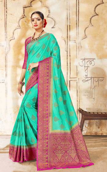 Grab This Very Pretty Designer Saree In Sea Green Color Paired With Contrasting Rani Pink Colored Blouse. This Saree Is Silk Based Paired With Jacquard Silk Fabricated Blouse. 