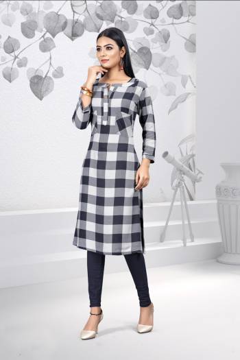 Simple And Elegant Looking Kurti Is Here For Your Casual And Semi-Casual Wear. This Pretty Kurti Is Fabricated On Rayon Beautified With Prints All Over. 