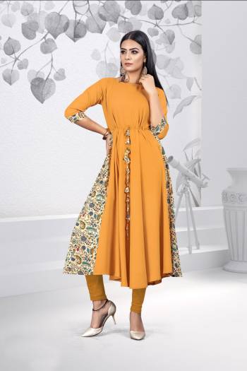 Simple And Elegant Looking Kurti Is Here For Your Casual And Semi-Casual Wear. This Pretty Kurti Is Fabricated On Rayon Beautified With Prints All Over. 