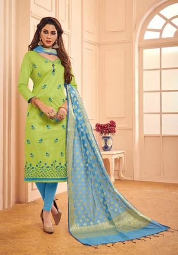 If Those Readymade Suit Does Not Lend You The Desired Comfort Than Grab This Designer Dress Material In Light Green Color Paired With Sky Blue Colored Bottom And Dupatta. This Pretty Dress Material Is Cotton Based Paired With Banarasi Silk Fabricated Dupatta. 