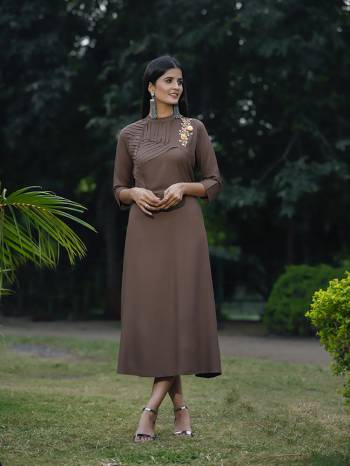 For Your Semi-Casuals Or Festive Wear, Grab This Designer Readymade Kurti In Brown Color Fabricated On Rayon. This Kurti Is Light In Weight And Easy To Carry All Day Long. 