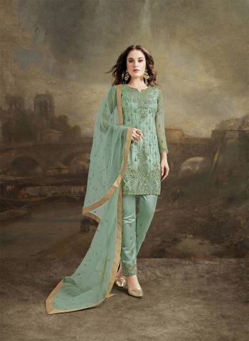 You Will Definitely Earn Lots Of Compliments Wearing This Designer Lovely Suit In Sea Green Color. This Pretty Suit Is Fabricated On Net Beautified With Tone To Tone Resham Work And Jari Work. Buy This Lovely Suit Now.