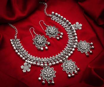 Give An Enhanced Look To Your Personality By Pairing Up This Beautiful Necklace Set With Your Ethnic Attire. This Pretty Set Is In Silver Color Which Can Be Paired With Any Colored Attire. Buy Now.