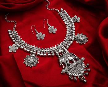 Give An Enhanced Look To Your Personality By Pairing Up This Beautiful Necklace Set With Your Ethnic Attire. This Pretty Set Is In Silver Color Which Can Be Paired With Any Colored Attire. Buy Now.