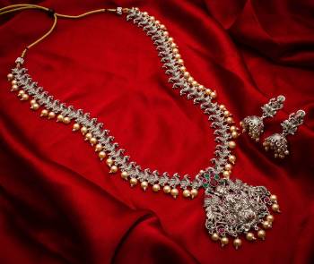 Give An Enhanced Look To Your Personality By Pairing Up This Beautiful Necklace Set With Your Ethnic Attire. This Pretty Set Is In Silver Color Which Can Be Paired With Any Colored Attire. Buy Now.