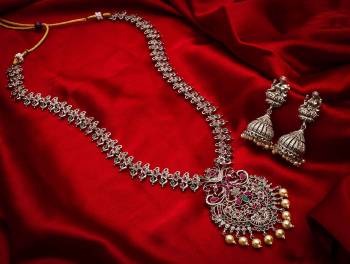 Give An Enhanced Look To Your Personality By Pairing Up This Beautiful Necklace Set With Your Ethnic Attire. This Pretty Set Is In Silver Color Which Can Be Paired With Any Colored Attire. Buy Now.